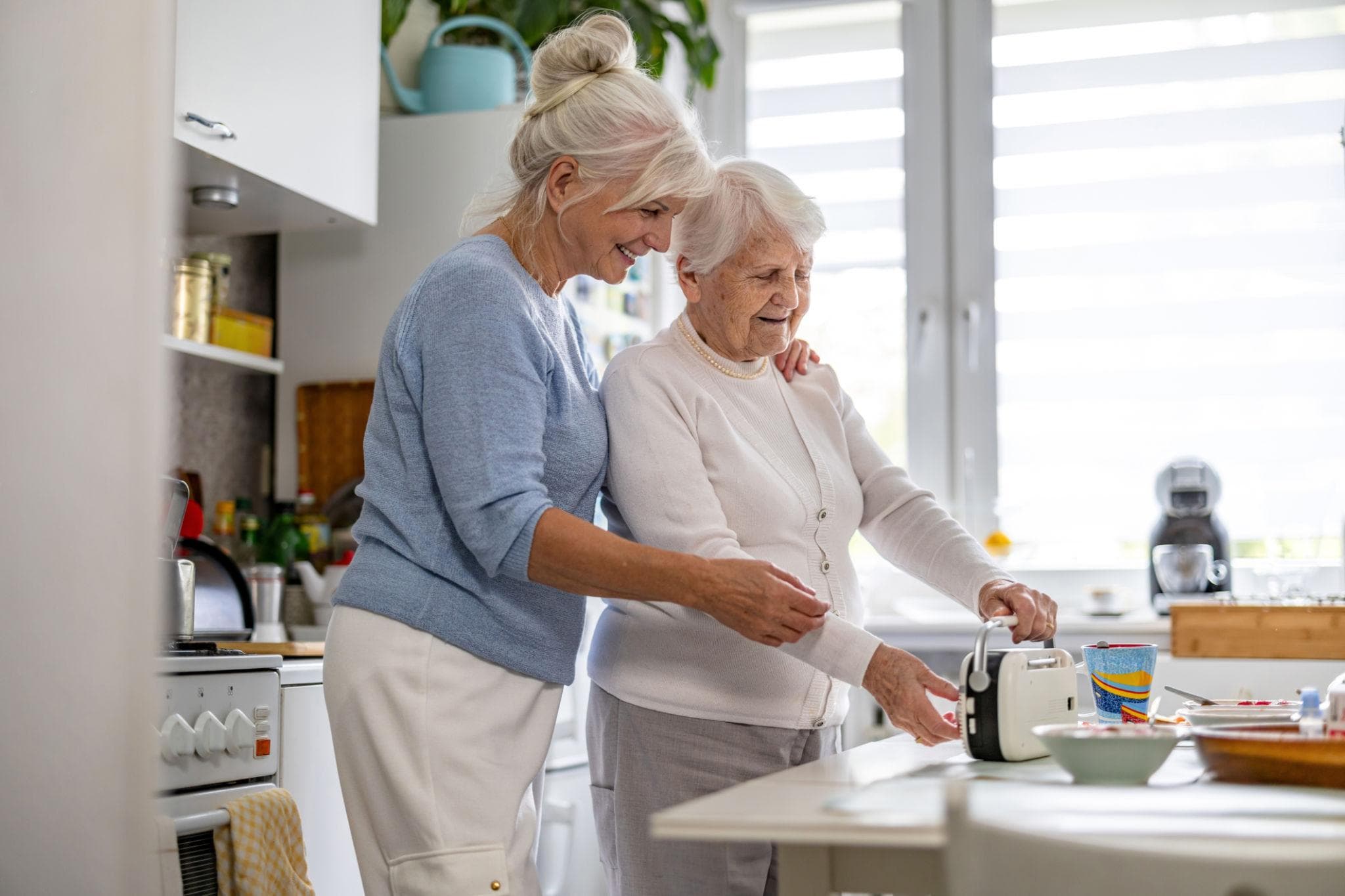 Caregiver spending meaningful time with an older adult at home